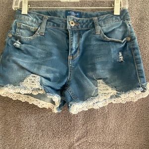 Riped jean shorts